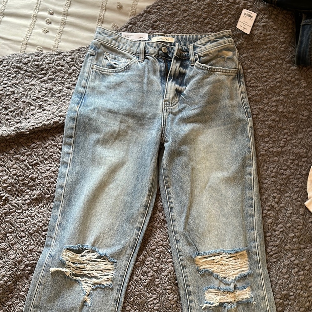 Wide leg distress high rise jeans